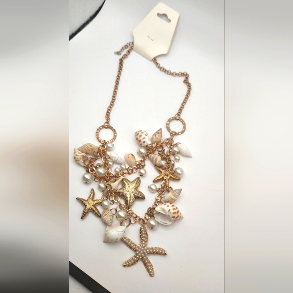 Gold tone Charm Seashell Necklace